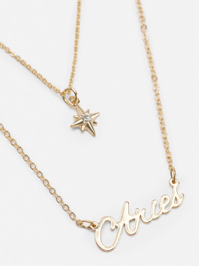 Gold Tone Layered Star Sign Necklace - Image 2